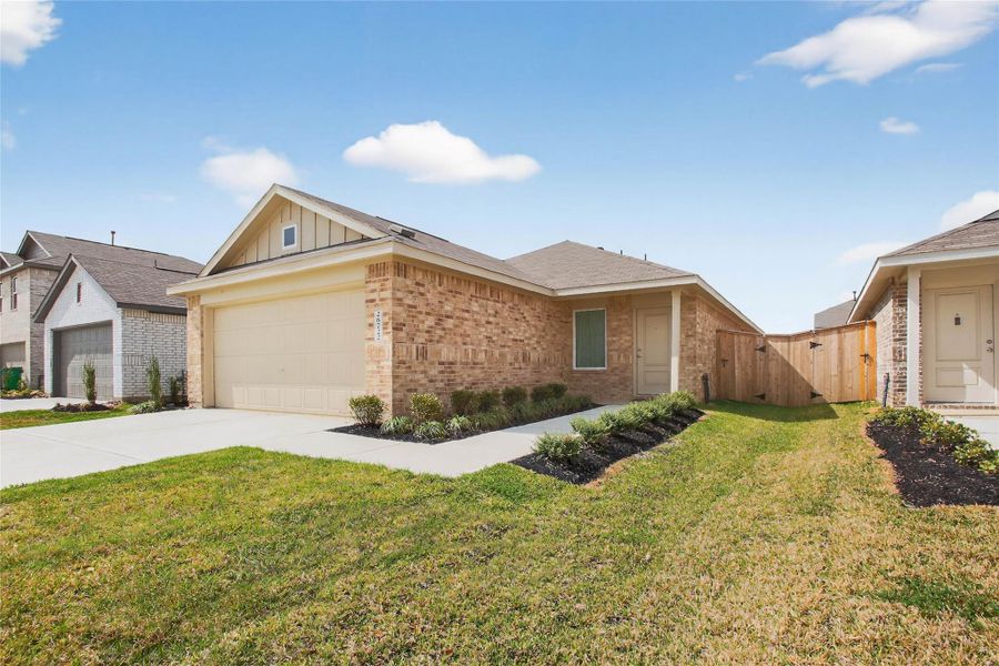 Front exterior of a new home in Anniston, Katy, TX, highlighting curb appeal (Image 25).