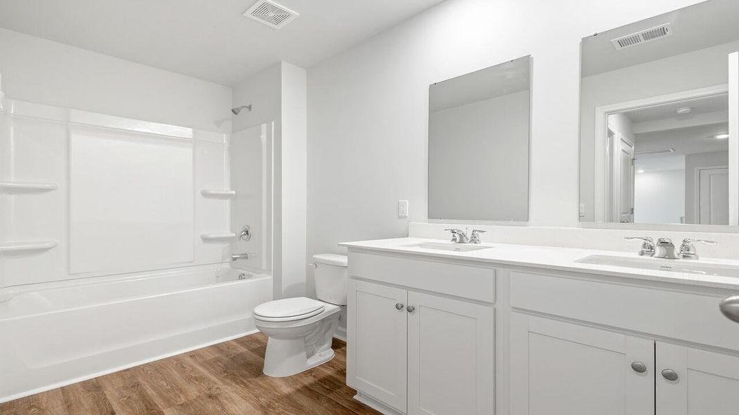 Furnished interior view inside a new home in The Cove at Mallard Crossing, Summerville (Image 10).