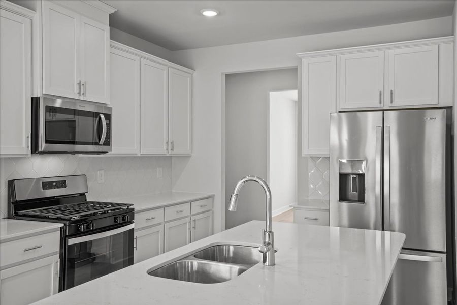 Furnished interior view inside a new home in The Farm at Wells Creek - Signature Collection, Gray Court (Image 8).