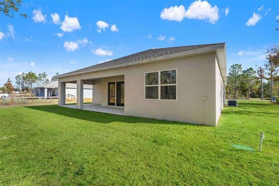 Exterior details and patio area of a home in , Weeki Wachee (Image 31).