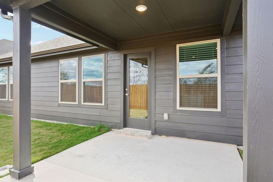 Exterior details and patio area of a home in Parks at Foster Crossing - Premier Series, Anna (Image 4). Exterior details and patio area of a home in Parks at Foster Crossing - Premier Series, Anna (Image 4).