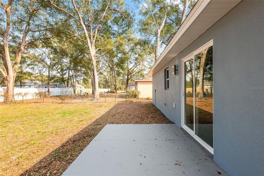 Exterior details and patio area of a home in , Dunnellon (Image 14).