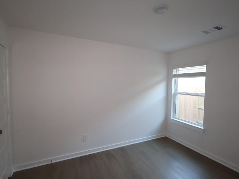 Spacious, unfurnished interior of a new home in Wildrye, Waller (Image 19).