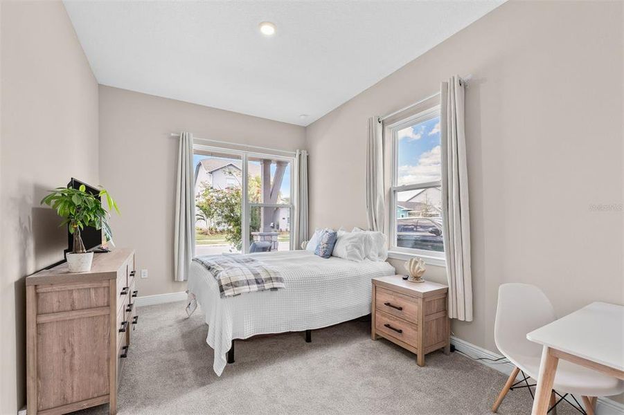 Furnished interior view inside a new home in Laureate Park, Orlando (Image 36).