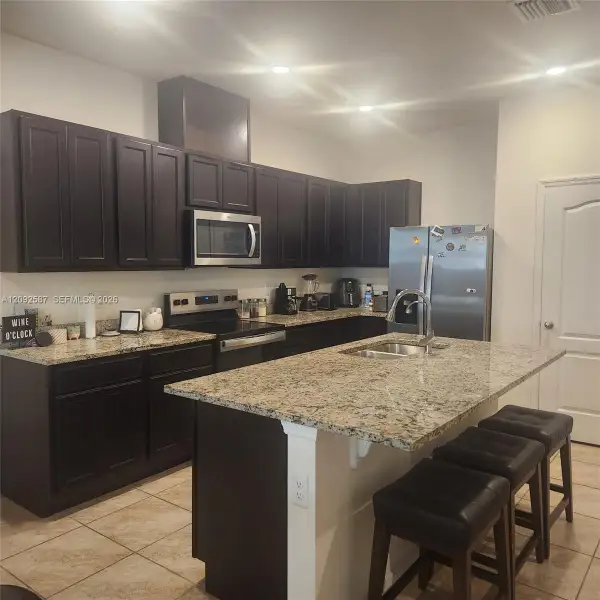 Furnished interior view inside a new home in , Davenport (Image 3).