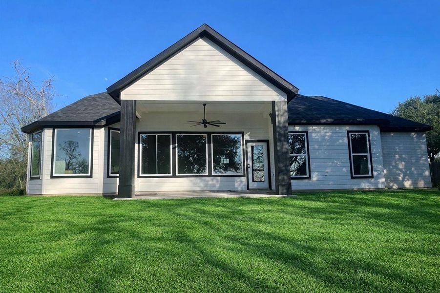 Exterior details and patio area of a home in , Willis (Image 2). Exterior details and patio area of a home in , Willis (Image 2).