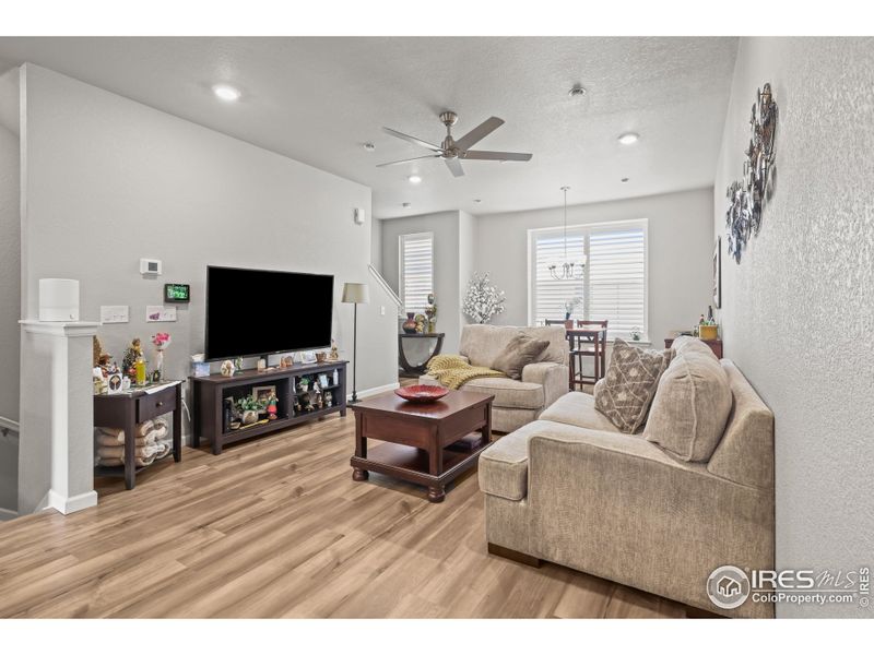 Open floorplan includes kitchen, living room and dining room with bright natural light. Open floorplan includes kitchen, living room and dining room with bright natural light.