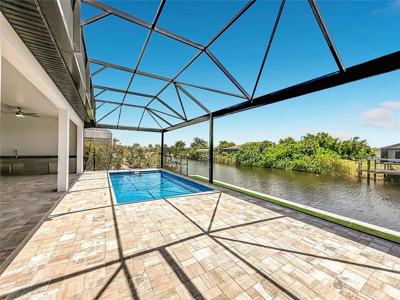Exterior details and patio area of a home in , Port Charlotte (Image 34).