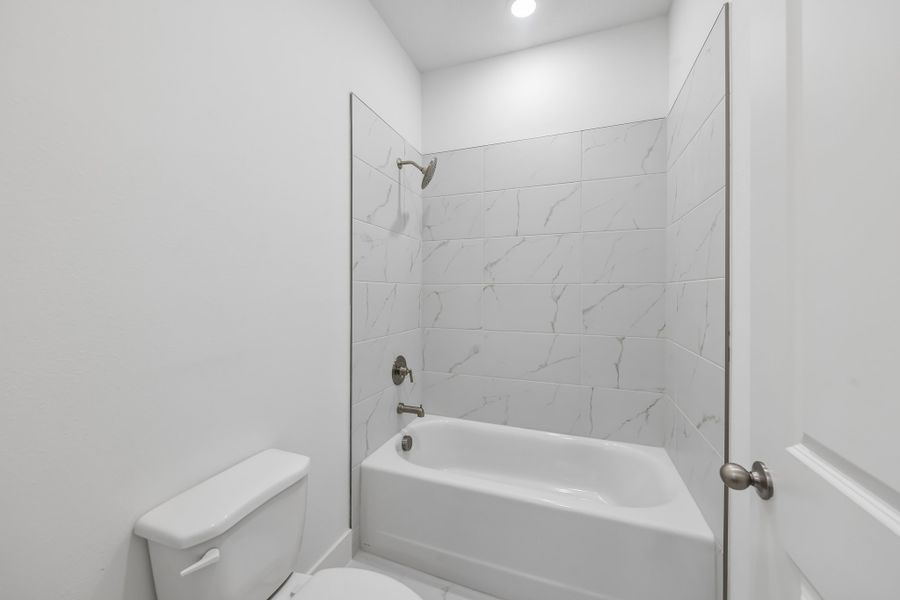 Representative furnished interior of a home built from the Lark by Hartizen Homes in Eden Crest, Apopka (Image 17).