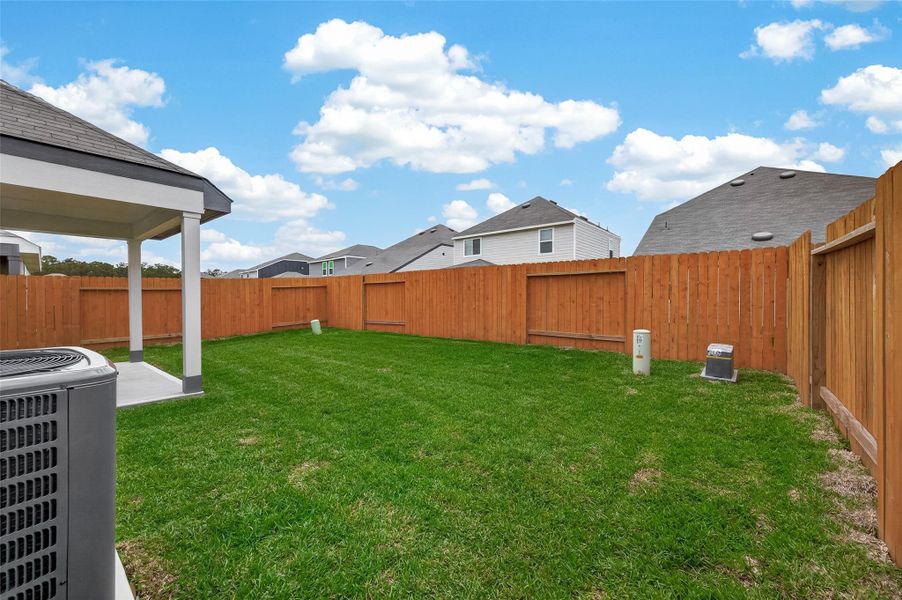 Exterior details and patio area of a home in Wayside Village, Houston (Image 4).