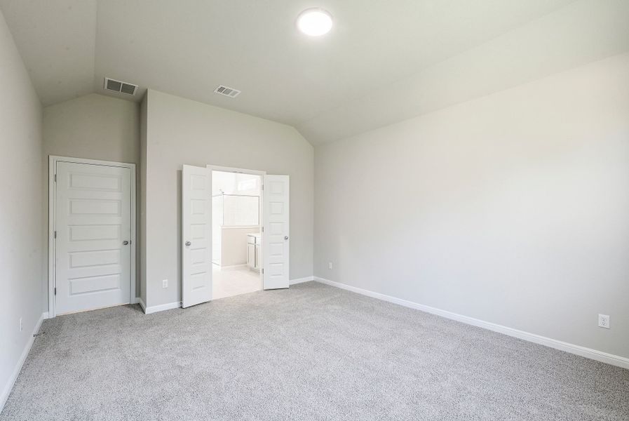 Primary Bedroom in the Willow home plan by Trophy Signature Homes – REPRESENTATIVE PHOTO Primary Bedroom in the Willow home plan by Trophy Signature Homes – REPRESENTATIVE PHOTO