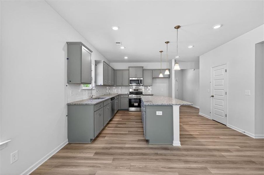 Furnished interior view inside a new home in Summerfield Place, Carrollton (Image 3).