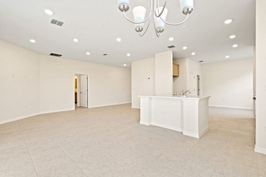 Representative unfurnished interior of a home built from the Biscayne by Holiday Builders in Eden Hills, Lake Alfred (Image 15).