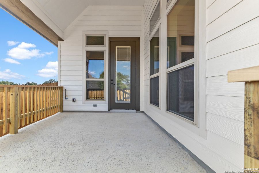 Exterior details and patio area of a home in The Enclave at Potranco Oaks, Castroville (Image 3).
