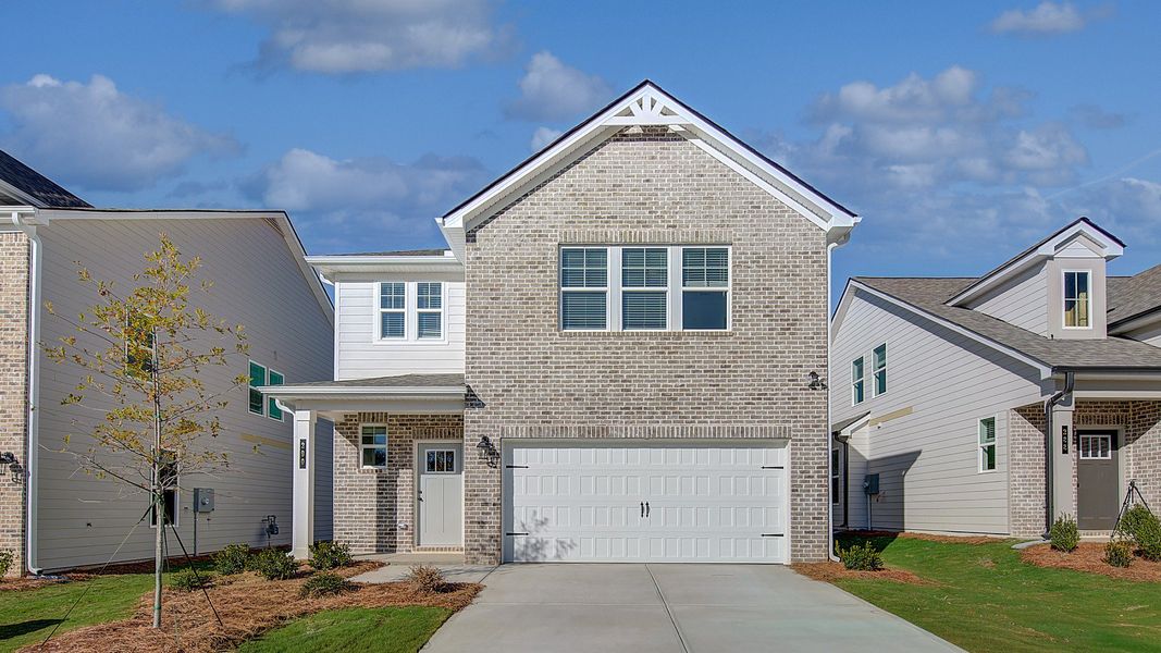 Representative exterior photo of a completed home built from the Zoey II by DRB Homes in Abbotts Crossing, Conyers, GA (Image 2). Representative exterior photo of a completed home built from the Zoey II by DRB Homes in Abbotts Crossing, Conyers, GA (Image 2).