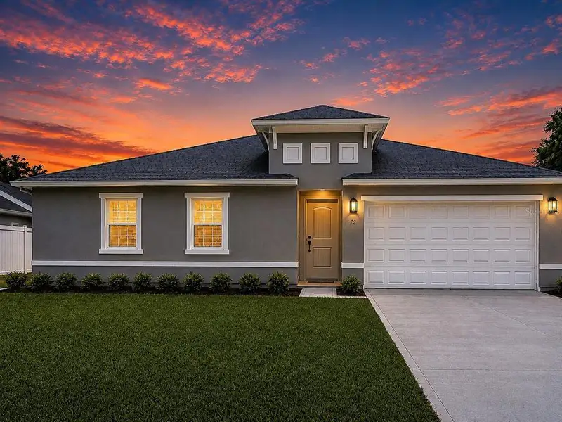 Front exterior of a new home in , Palm Coast, FL, highlighting curb appeal (Image 2). Front exterior of a new home in , Palm Coast, FL, highlighting curb appeal (Image 2).