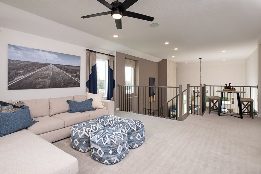 Representative furnished interior of a home built from the Logan by Tri Pointe Homes in Painted Tree, McKinney (Image 9).