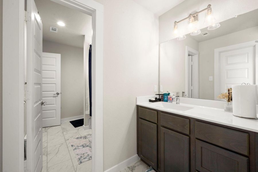 Furnished interior view inside a new home in Bradbury Forest, Spring (Image 18).