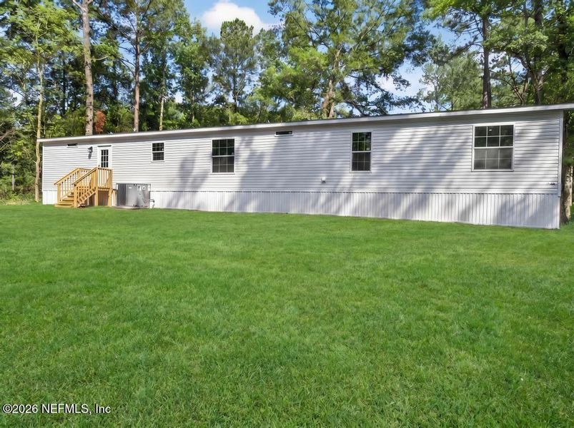 Exterior details and patio area of a home in , Middleburg (Image 26).