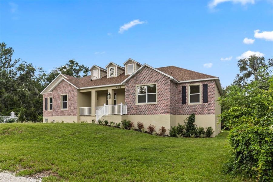 Front exterior of a new home in , Riverview, FL, highlighting curb appeal (Image 1). Front exterior of a new home in , Riverview, FL, highlighting curb appeal (Image 1).