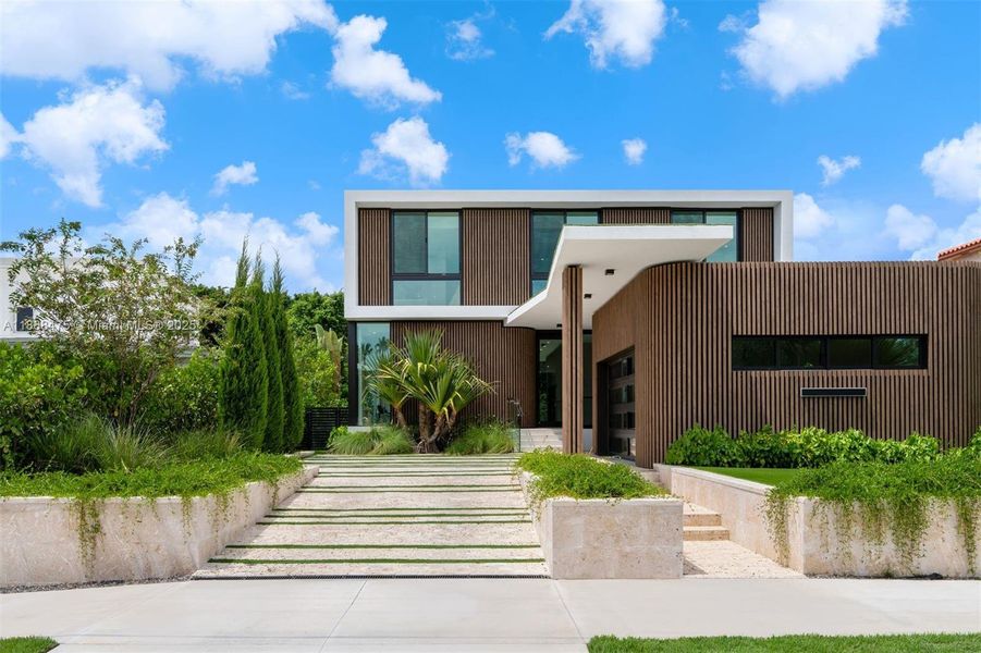 Front exterior of a new home in , Miami Beach, FL, highlighting curb appeal (Image 30). Front exterior of a new home in , Miami Beach, FL, highlighting curb appeal (Image 30).