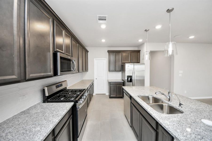 Furnished interior view inside a new home in Sweetgrass Village, Crosby (Image 12).