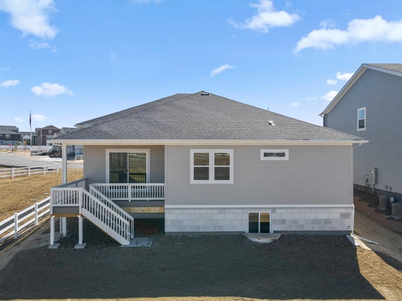 Exterior details and patio area of a home in The Estates Collection at Murphy Creek, Aurora (Image 4).