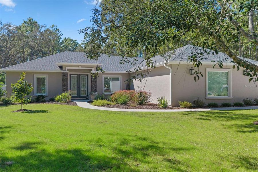 Front exterior of a new home in , Beverly Hills, FL, highlighting curb appeal (Image 1). Front exterior of a new home in , Beverly Hills, FL, highlighting curb appeal (Image 1).