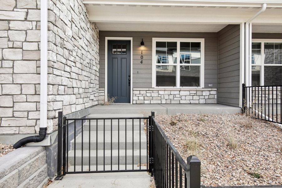 Exterior details and patio area of a home in Highlands at Fox Hill, Longmont (Image 2).