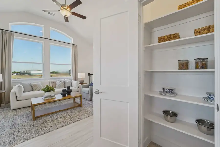 Representative furnished interior of a home built from the Margaux by Chesmar Homes in Bridgeland Chateau, Cypress (Image 19).