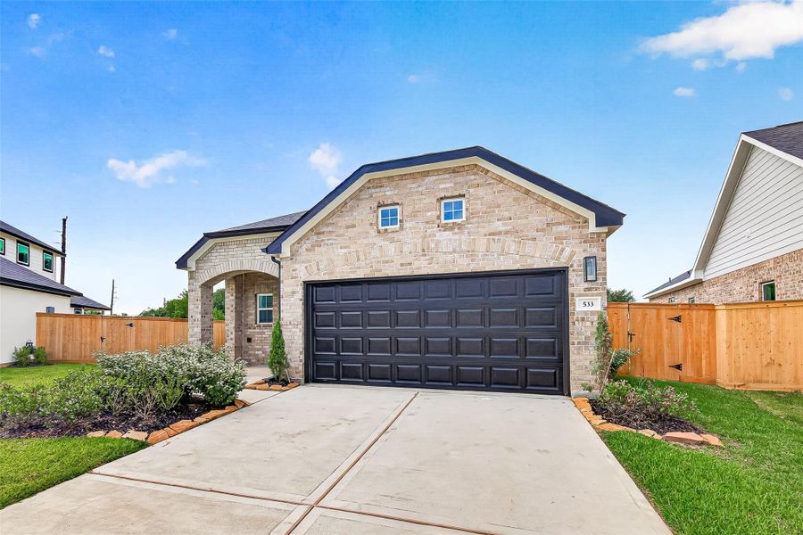Front exterior of a new home in , Brookshire, TX, highlighting curb appeal (Image 19). Front exterior of a new home in , Brookshire, TX, highlighting curb appeal (Image 19).
