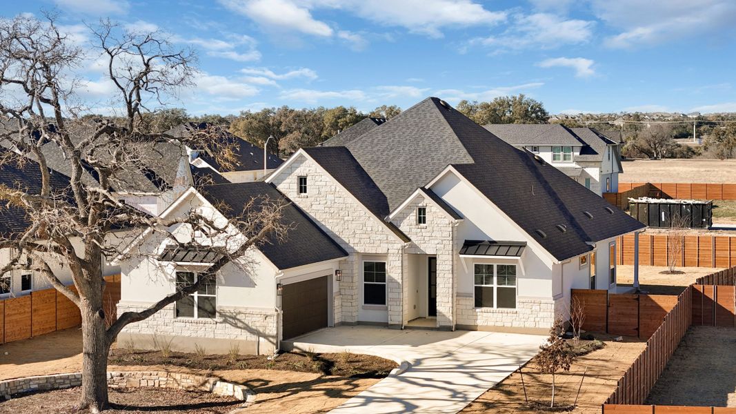 Front exterior of a new home in Broken Oak, Georgetown, TX, highlighting curb appeal (Image 31).