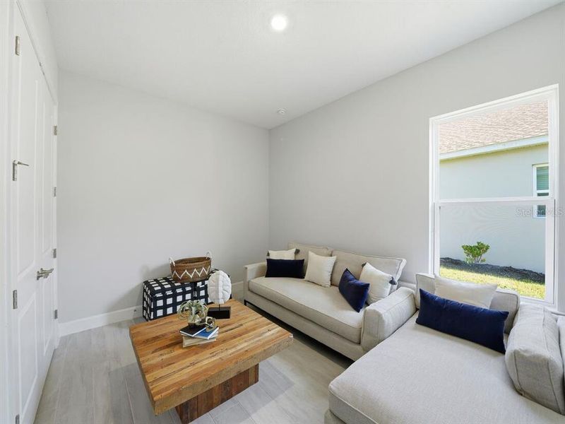 Furnished interior view inside a new home in Esplanade at Westview, Kissimmee (Image 17).