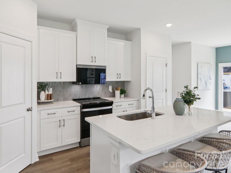 Photo is not of the actual home, but is an inspirational photo of builder’s model home and may depict options, furnishings, and/or decorator features that are not included Photo is not of the actual home, but is an inspirational photo of builder’s model home and may depict options, furnishings, and/or decorator features that are not included