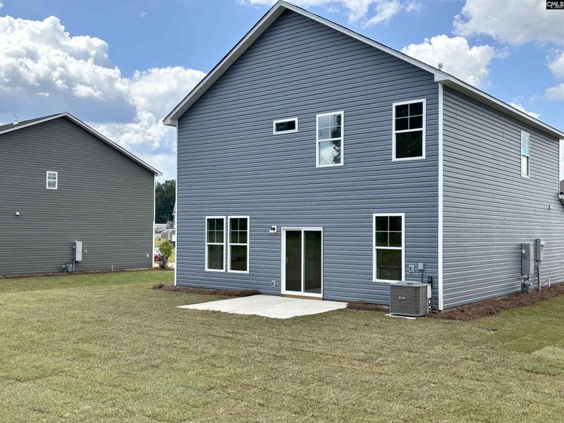 Front exterior of a new home in Rolling Hills, Prosperity, SC, highlighting curb appeal (Image 6).
