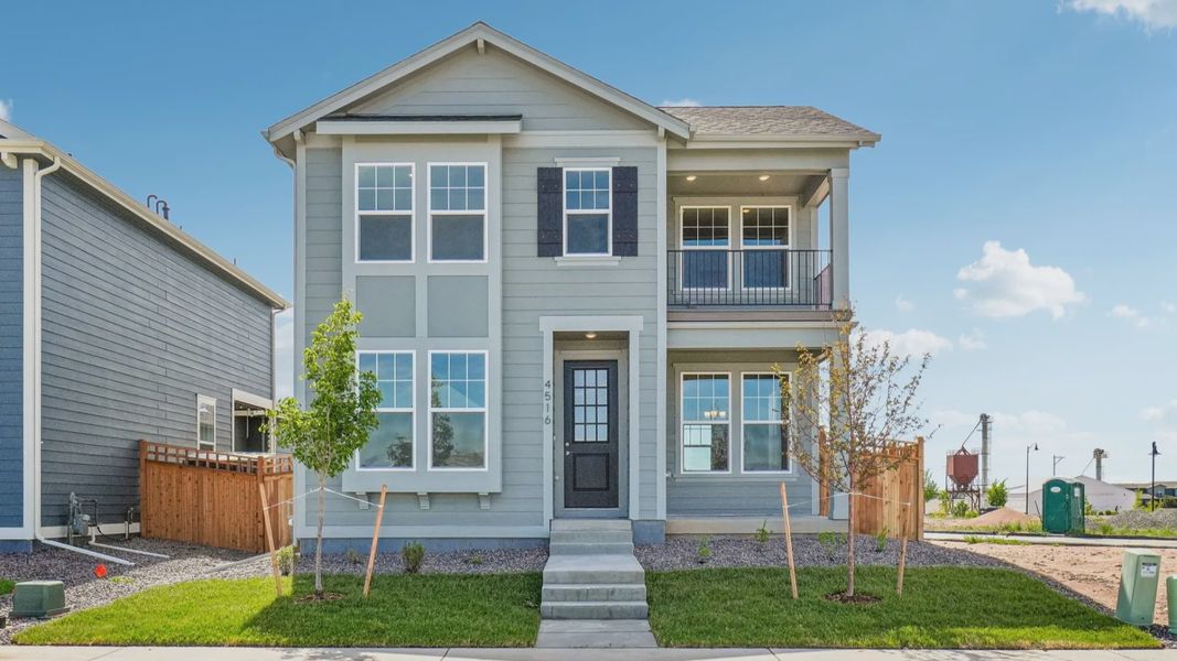 Front exterior of a new home in Timnath Lakes, Timnath, CO, highlighting curb appeal (Image 1). Front exterior of a new home in Timnath Lakes, Timnath, CO, highlighting curb appeal (Image 1).