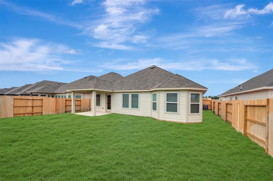 Exterior details and patio area of a home in Lone Star Landing, Montgomery (Image 4).