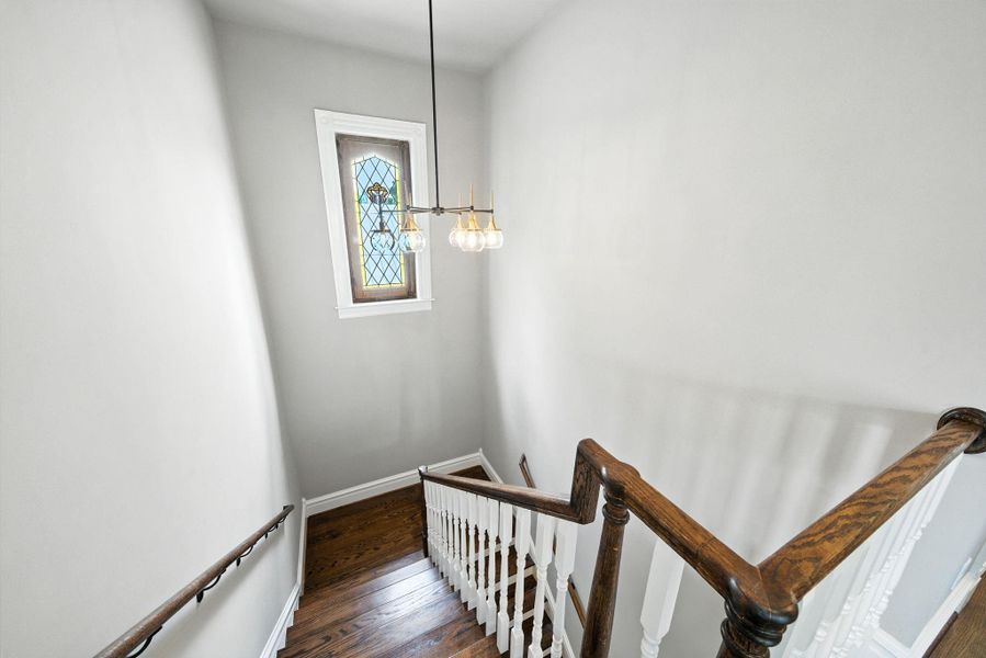 Up we go to the 2nd floor!! Beautiful stained glass window that provides so much natural light and makes such an impact in this area! Up we go to the 2nd floor!! Beautiful stained glass window that provides so much natural light and makes such an impact in this area!