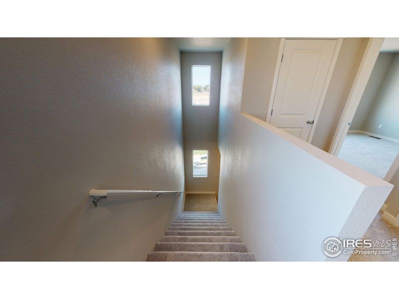 Stock Photo, may contain additional upgrades - Stairs to 2nd floor