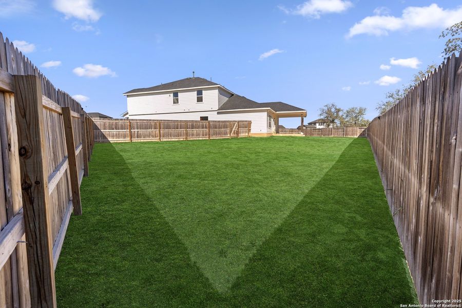 Exterior details and patio area of a home in Hickory Ridge, Elmendorf (Image 4).