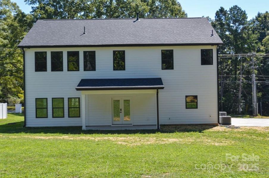 Front exterior of a new home in , Davidson, NC, highlighting curb appeal (Image 2).