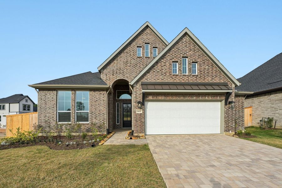 Front exterior of a new home in Kresston, Montgomery, TX, highlighting curb appeal (Image 25).