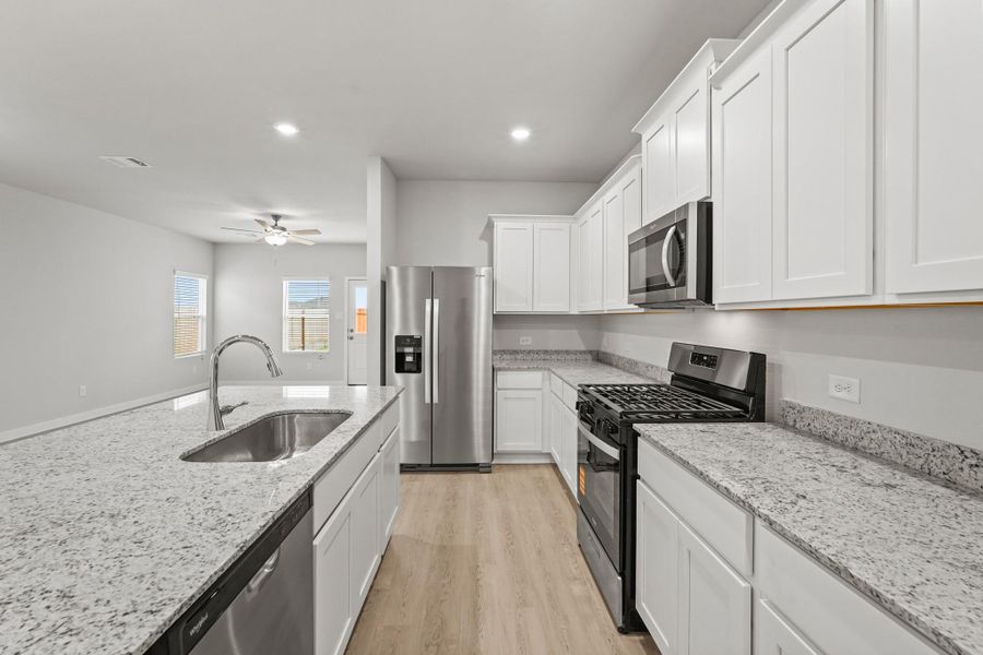 Furnished interior view inside a new home in Lonestar Collection at Paloma at Sanford Farms, Waller (Image 5).