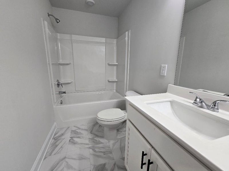 Furnished interior view inside a new home in Waters Edge, Mansfield (Image 8).