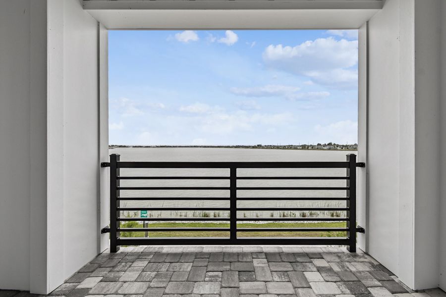 Exterior details and patio area of a home in Emerald Landing at Waterside at Lakewood Ranch – City Homes, Sarasota (Image 4).