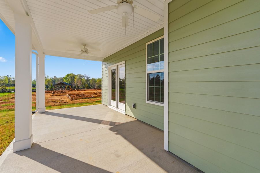 Exterior details and patio area of a home in Bens Crossing, Woodruff (Image 4).