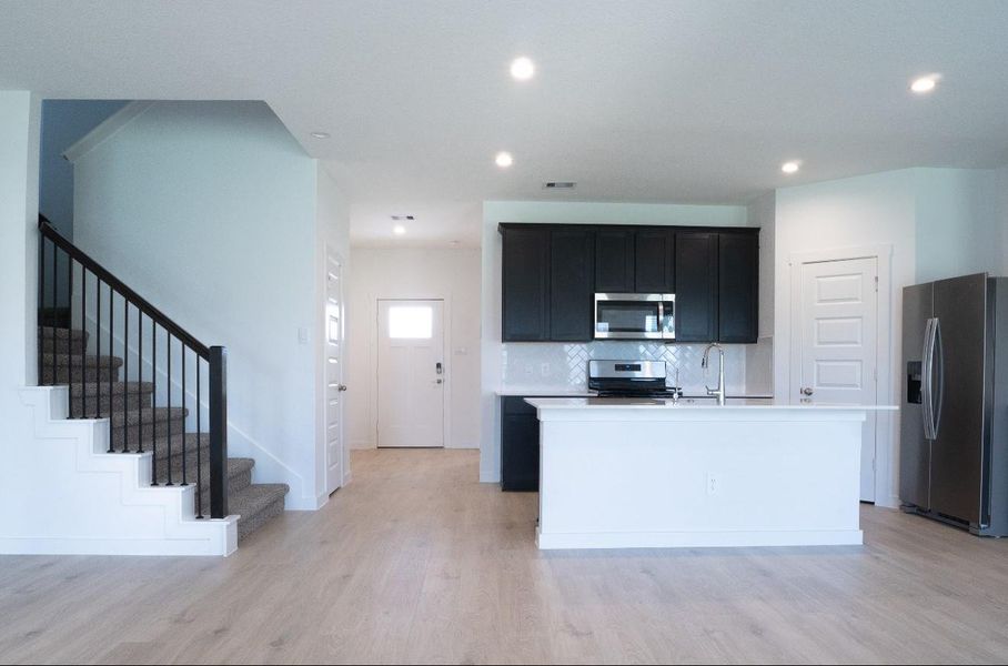 Furnished interior view inside a new home in Tamarron, Katy (Image 10).