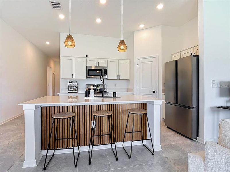 Furnished interior view inside a new home in , Kissimmee (Image 8).