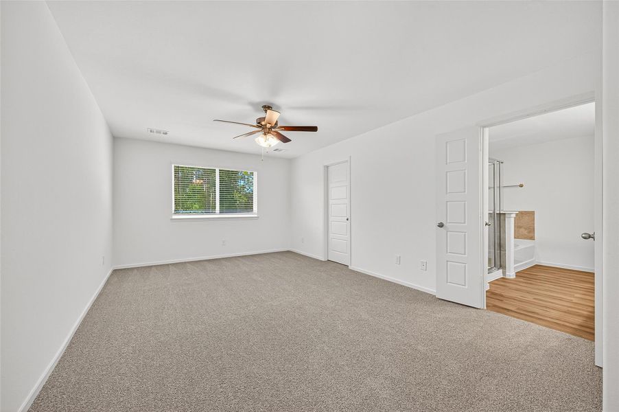 Spacious, unfurnished interior of a new home in Mill Creek Trails, Magnolia (Image 21).