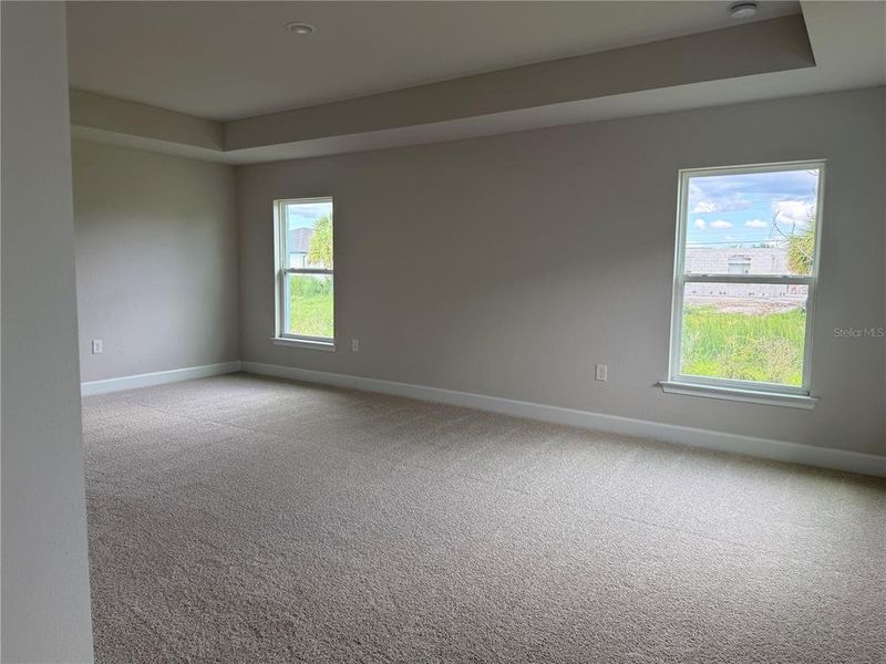 Spacious, unfurnished interior of a new home in Watercress Cove, North Port (Image 8).